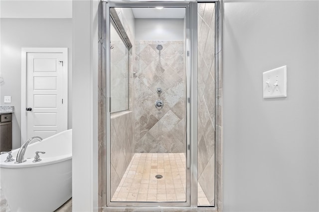 bathroom featuring plus walk in shower