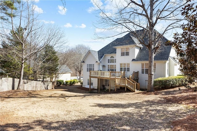 rear view of property with a deck