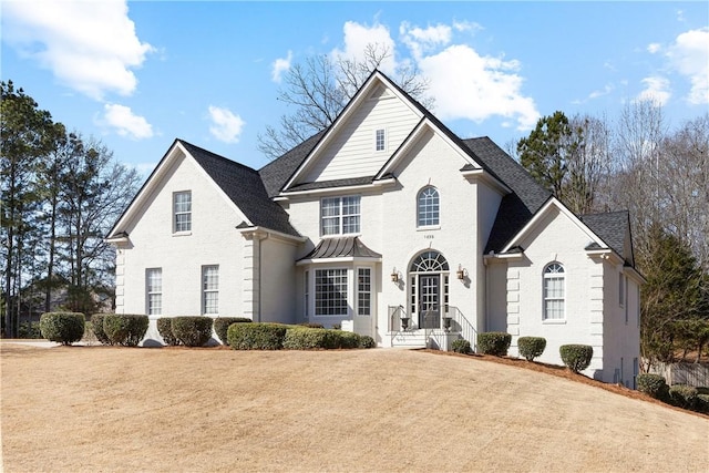 view of front property with a front lawn