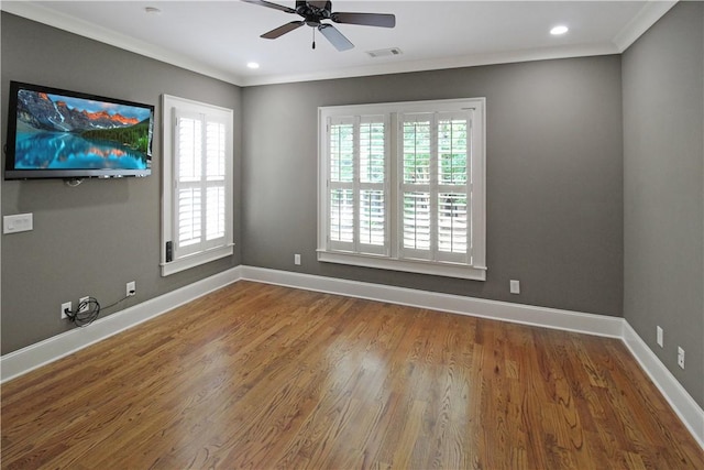 2904 Lone Eagle Ln, Opelika, AL 36801 - empty room featuring ornamental molding, a ceiling fan, baseboards, wood finished floors, and recessed lighting