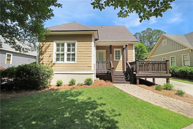 2904 Lone Eagle Ln, Opelika, AL 36801 - bungalow-style home with roof with shingles and a front lawn