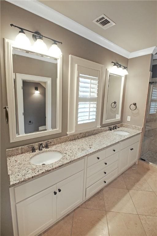 2904 Lone Eagle Ln, Opelika, AL 36801 - full bath with crown molding, tile patterned floors, and double vanity