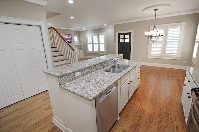 2904 Lone Eagle Ln, Opelika, AL 36801 - kitchen featuring dishwasher, a sink, white cabinets, ornamental molding, and light wood-style floors