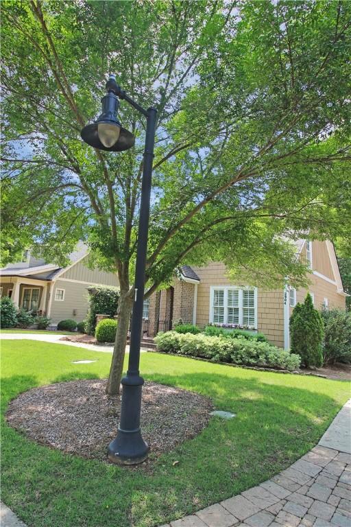 2904 Lone Eagle Ln, Opelika, AL 36801 - obstructed view of property featuring a front lawn