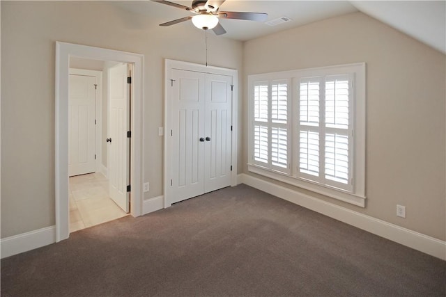 2904 Lone Eagle Ln, Opelika, AL 36801 - unfurnished bedroom featuring carpet floors, vaulted ceiling, baseboards, ceiling fan, and a closet