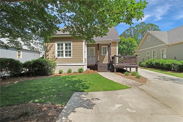 2904 Lone Eagle Ln, Opelika, AL 36801 - view of front of house featuring a front yard, covered porch, and a shingled roof