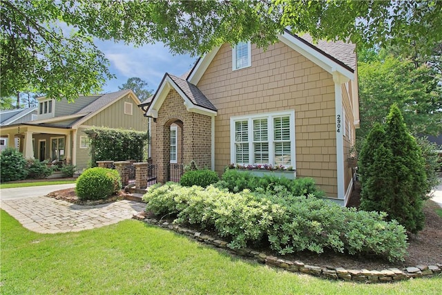 2904 Lone Eagle Ln, Opelika, AL 36801 - view of front of property with roof with shingles and a front lawn