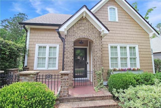 2904 Lone Eagle Ln, Opelika, AL 36801 - property entrance with a shingled roof and stone siding