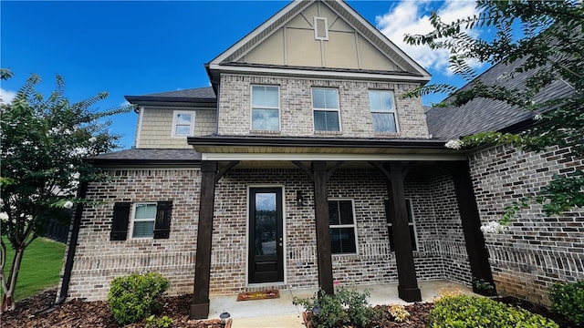 view of front of home featuring covered porch