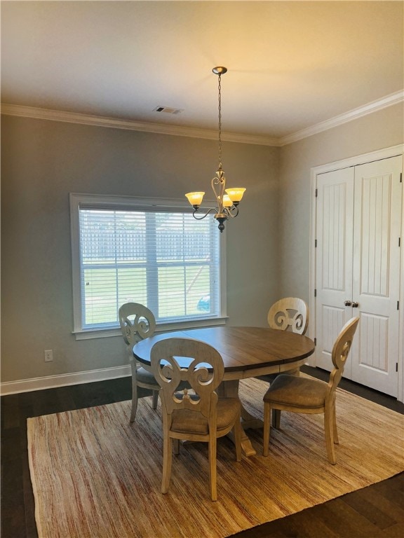 dining area featuring a chandelier, hardwood / wood-style floors, and a healthy amount of sunlight