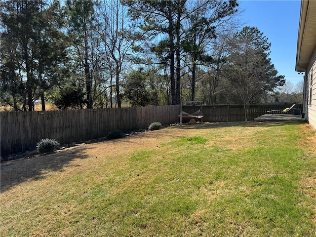 view of yard featuring a fenced backyard