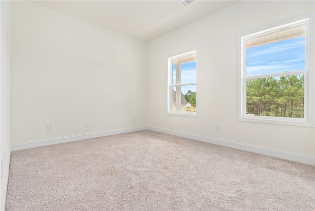 empty room featuring carpet flooring