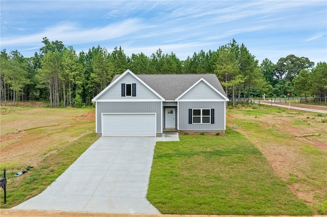 ranch-style home featuring a front yard and a garage