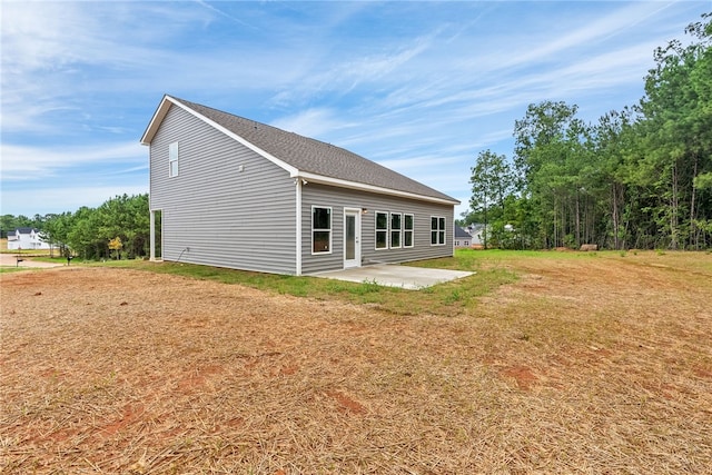 back of house featuring a patio area