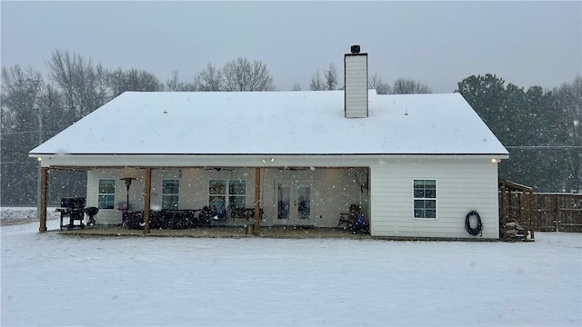 view of snow covered property