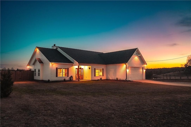 view of front of property featuring a garage