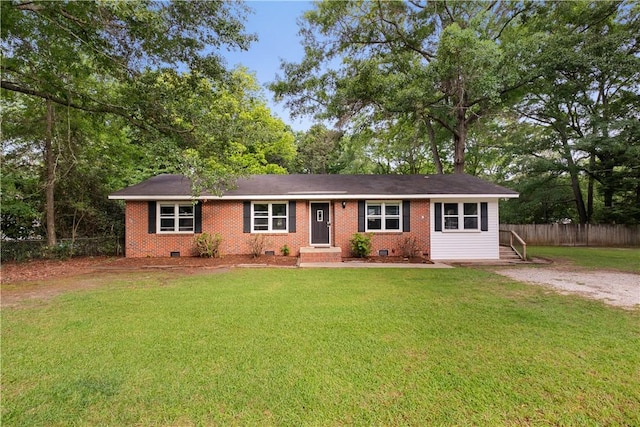 single story home with crawl space and brick siding