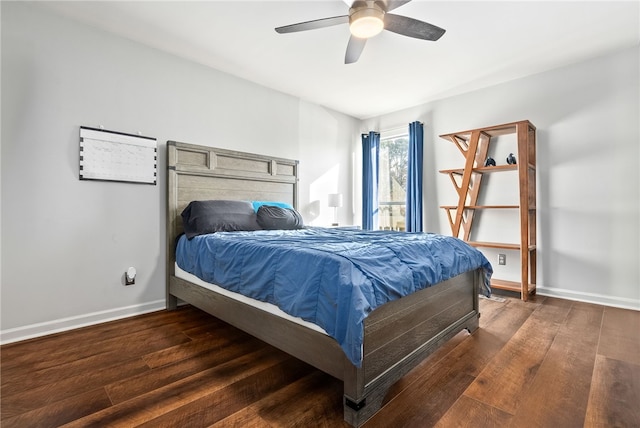 bedroom featuring dark hardwood / wood-style floors and ceiling fan