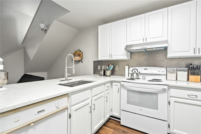 kitchen with white cabinets, dark hardwood / wood-style flooring, white appliances, and sink