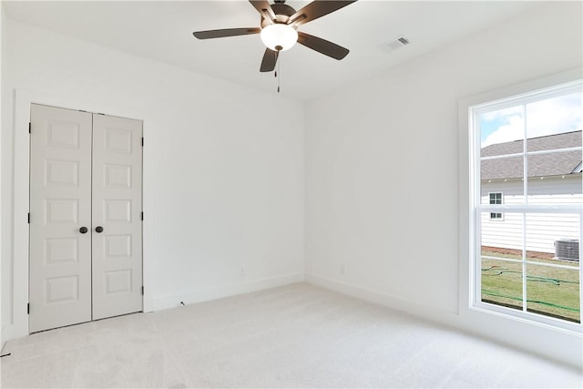 1013 Crossing Ct E, Valley, AL 36854 - spare room with light colored carpet, plenty of natural light, and a ceiling fan
