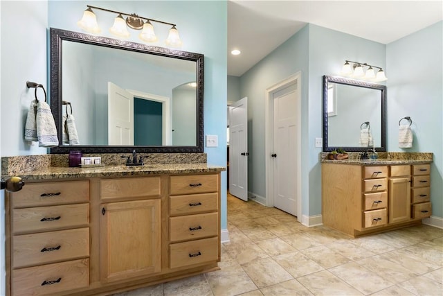 4112 Creekview Ct, Auburn, AL 36832 - bathroom with two vanities and tile patterned flooring