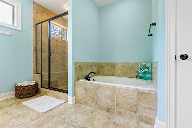 4112 Creekview Ct, Auburn, AL 36832 - bathroom with a bath, a stall shower, and plenty of natural light