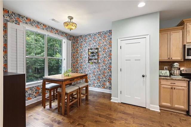 4112 Creekview Ct, Auburn, AL 36832 - dining space with wallpapered walls, dark wood finished floors, and recessed lighting