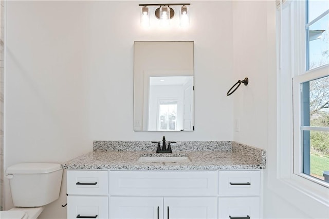 085 Bradley Ln, Auburn, AL 36830 - bathroom featuring vanity and toilet