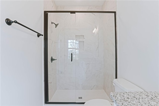 085 Bradley Ln, Auburn, AL 36830 - full bathroom featuring a stall shower and toilet
