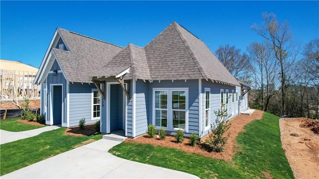 085 Bradley Ln, Auburn, AL 36830 - view of front facade featuring a shingled roof and a front yard