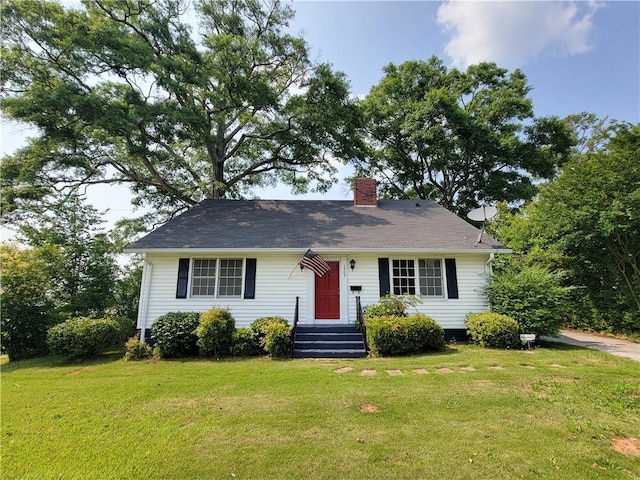 1905 30th St, Valley, AL 36854 - view of front of property featuring a front yard and a chimney