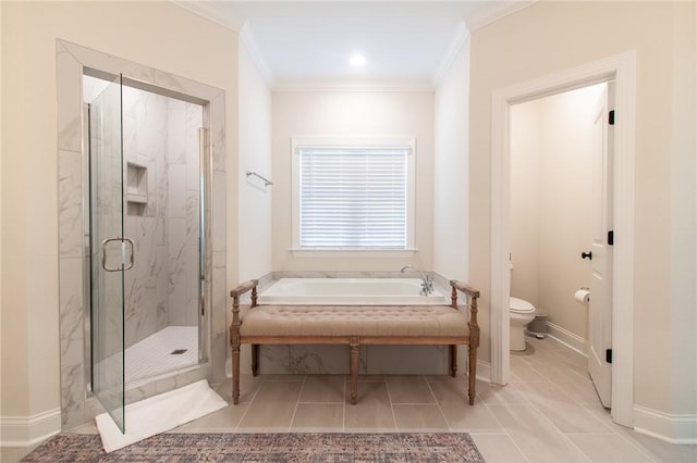 bathroom with tile patterned flooring, shower with separate bathtub, toilet, and crown molding