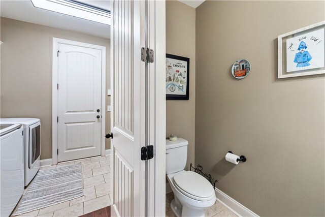 1895 Talcott Ct, Auburn, AL 36830 - laundry room with washing machine and dryer and baseboards