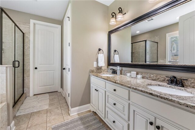 1895 Talcott Ct, Auburn, AL 36830 - bathroom featuring double vanity and a stall shower