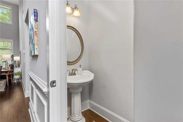 2217 Morgan Dr, Auburn, AL 36830 - bathroom with plenty of natural light, baseboards, and wood finished floors