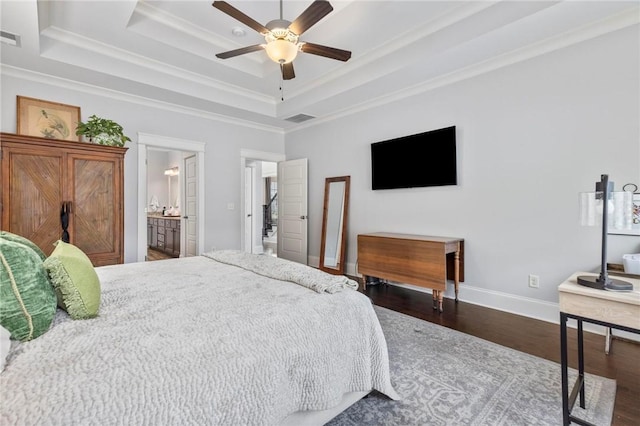 2217 Morgan Dr, Auburn, AL 36830 - bedroom featuring a raised ceiling, wood finished floors, ornamental molding, baseboards, and ensuite bathroom