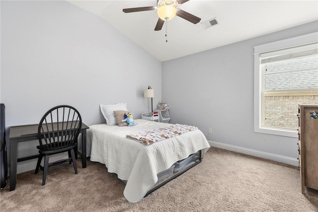 2217 Morgan Dr, Auburn, AL 36830 - carpeted bedroom with vaulted ceiling, ceiling fan, and baseboards