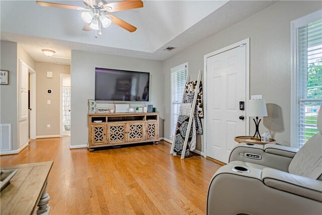205 Summerbrooke Loop, Phenix City, AL 36870 - living room with light wood-style floors, ceiling fan, and baseboards