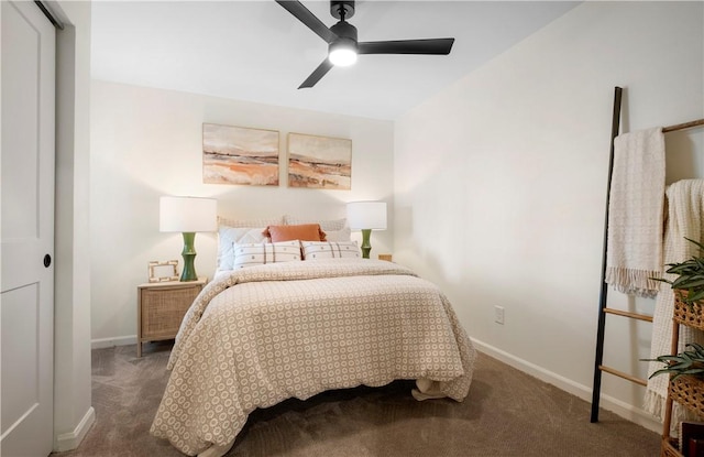 carpeted bedroom with baseboards and a ceiling fan