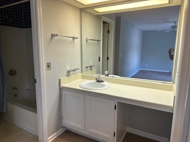 371 E Thach Ave Unit 4, Auburn, AL 36830 - full bathroom featuring vanity,  shower combination, and baseboards
