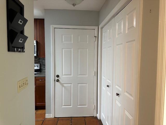371 E Thach Ave Unit 4, Auburn, AL 36830 - corridor featuring dark tile patterned flooring