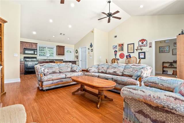 802 W Longleaf Dr Unit 71, Auburn, AL 36832 - living room with ceiling fan, high vaulted ceiling, light wood-style flooring, recessed lighting, and baseboards