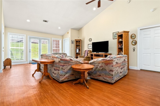 802 W Longleaf Dr Unit 71, Auburn, AL 36832 - living area with wood finished floors, a ceiling fan, baseboards, high vaulted ceiling, and recessed lighting