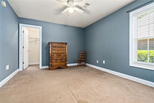 802 W Longleaf Dr Unit 71, Auburn, AL 36832 - carpeted bedroom with baseboards, ceiling fan, and a closet