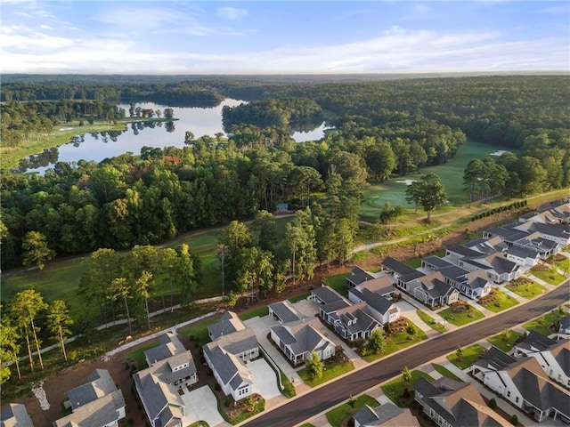 bird's eye view with a water view, a residential view, and a forest view