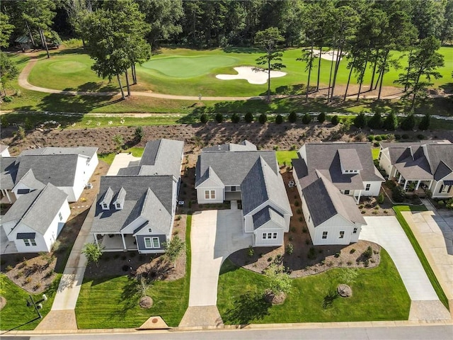 aerial view featuring a residential view and golf course view