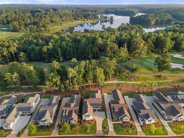 aerial view featuring a water view, view of golf course, and a residential view