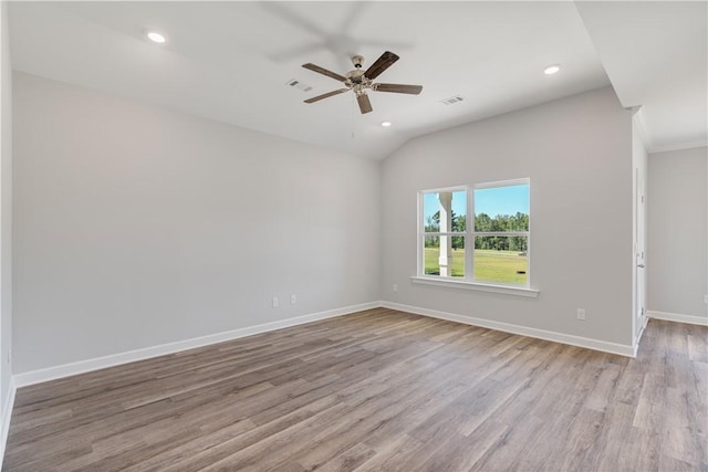 spare room featuring recessed lighting, visible vents, a ceiling fan, wood finished floors, and baseboards