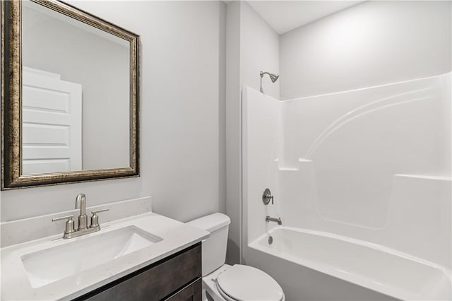 full bathroom featuring toilet, shower / washtub combination, and vanity