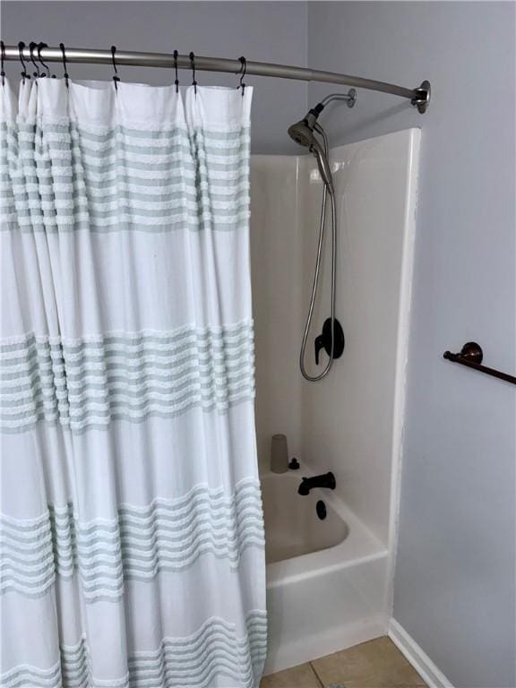 1202 Northgate Dr, Opelika, AL 36801 - bathroom featuring shower / tub combo and tile patterned flooring